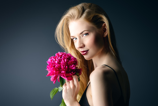 flower fragrance. Sexy young woman - Photo, Image
