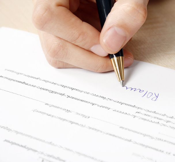 Signing the contract - 写真・画像