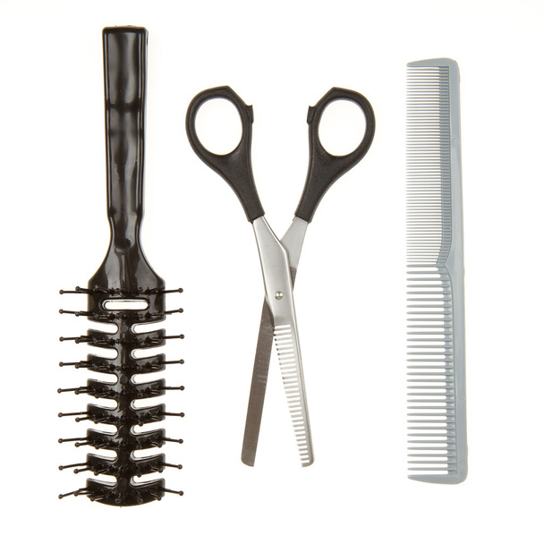 Cutting scissors or shears and black comb and a black brush - Photo, Image