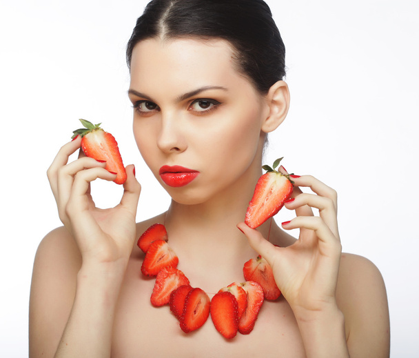 woman with strawberry on the white background - Zdjęcie, obraz