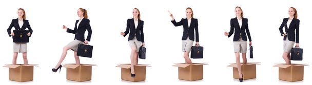 Businesswoman with boxes isolated on white - Photo, Image
