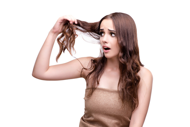 Femme vérifiant sa coupe de cheveux isolé sur blanc
 - Photo, image