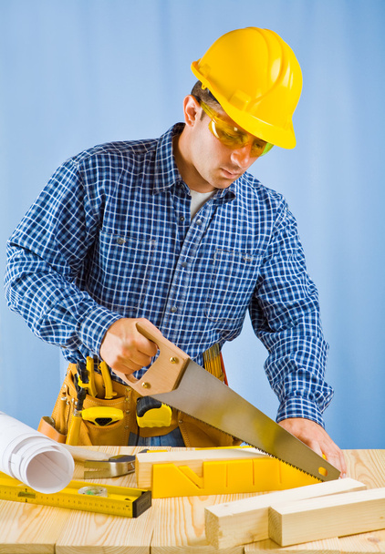 men cutting plank - Foto, Imagen