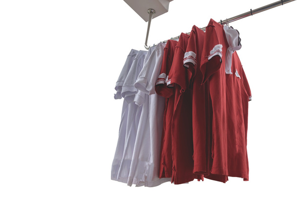 Camisetas rojas y blancas
  - Foto, Imagen