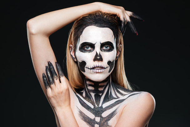 Portrait of girl with scared skeleton makeup - Φωτογραφία, εικόνα
