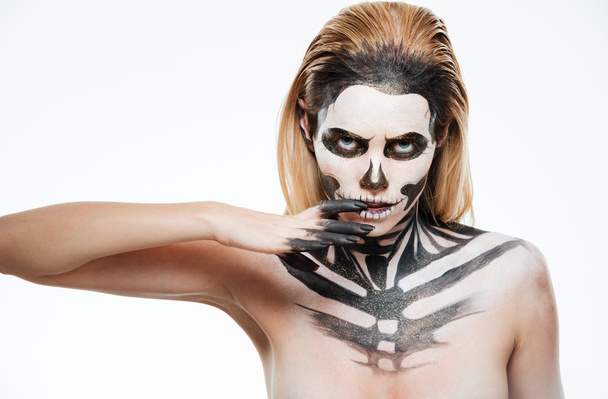 Portrait of young woman with gothic skeleton makeup - Фото, зображення