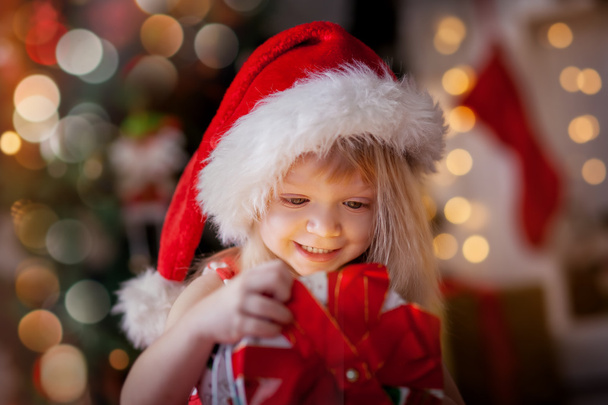    Little girl at christmas Eve  - Foto, afbeelding