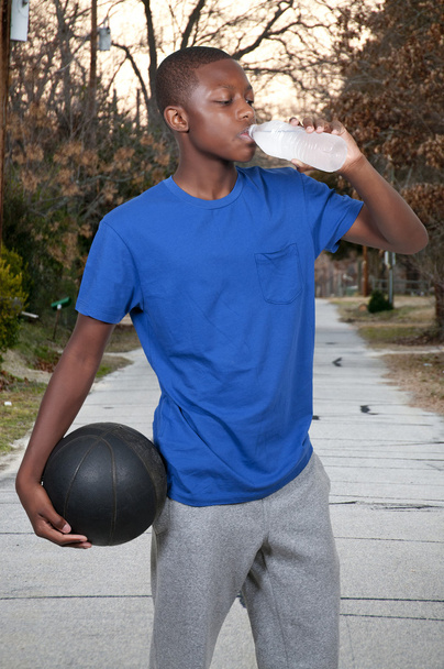 Teenager with Basketball - Photo, Image