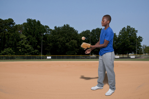 Jogador de beisebol adolescente
 - Foto, Imagem