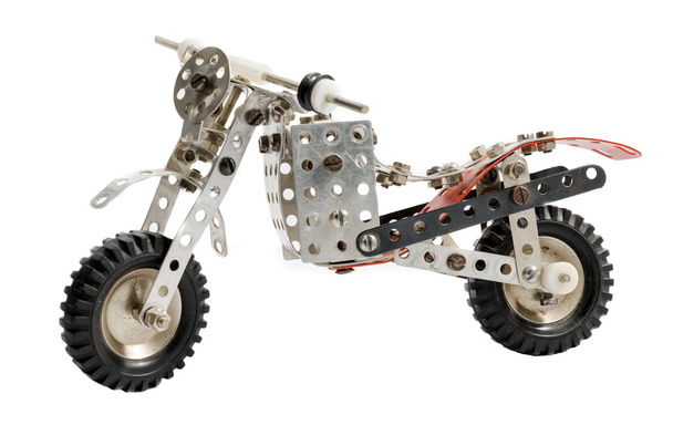  Zabawka stary vintage motocykl na białym tle - Zdjęcie, obraz