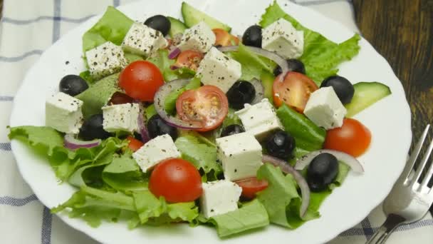 salad with fresh vegetables and feta cheese - Footage, Video
