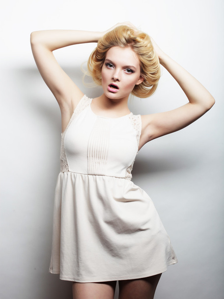 young magnificent woman in white dress. - Fotó, kép