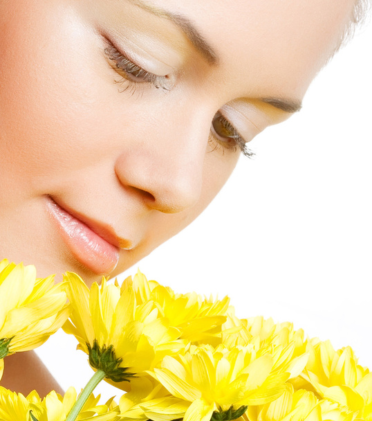 female face with the yellow chrysanthemum - Foto, Imagem