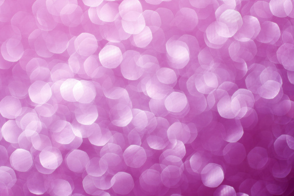 Pink glittering lights. Blurred abstract background - Foto, Imagen
