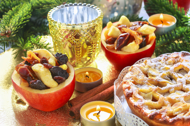 Apple pie on and stuffed apples on christmas table - Φωτογραφία, εικόνα