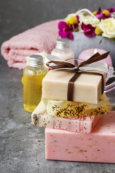 Spa set: bars of handmade soap and bottle of essential oil - Photo, image