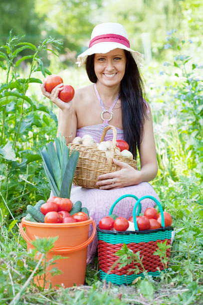 Happy woman with harvested vegetables - Valokuva, kuva