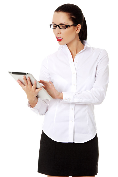 Business woman holding tablet PC with touchpad. - Fotografie, Obrázek