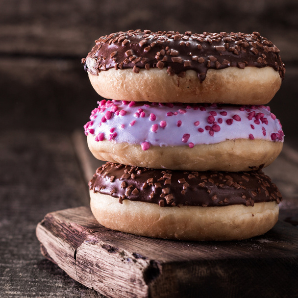 Donut. Sweet icing sugar food. Dessert colorful snack. Glazed sprinkles. - Zdjęcie, obraz