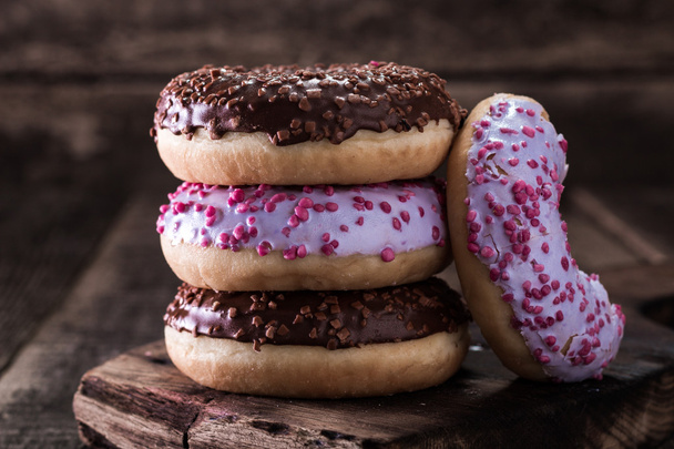 Donut. Sweet icing sugar food. Dessert colorful snack. Glazed sprinkles. - Zdjęcie, obraz