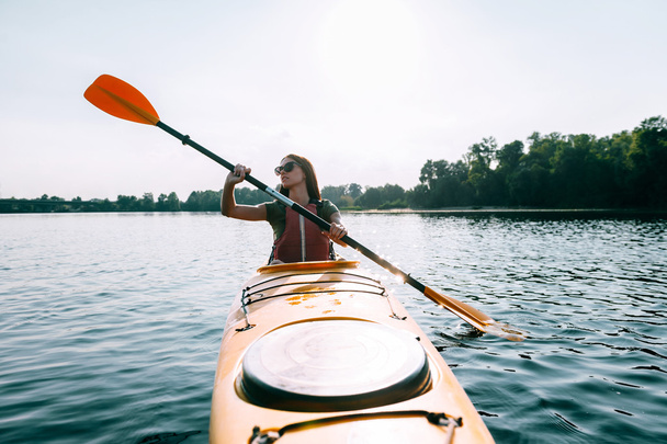 beautiful woman kayaking  - Valokuva, kuva