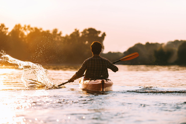 young man kayaking  - Photo, image