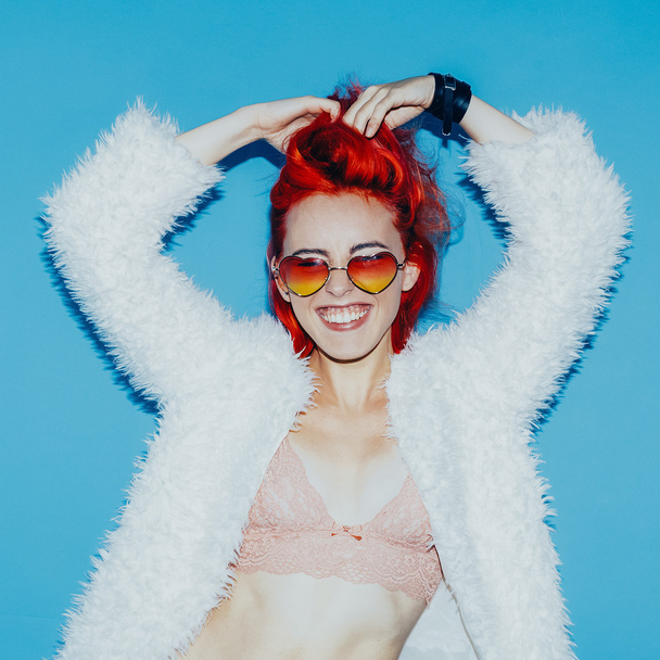 Happy Girl. Stylish red hair, glamorous coat,  sunglasses. Club  - Photo, Image
