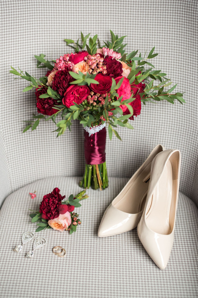 wedding details of a ring shoe bouquet - Fotó, kép