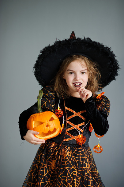 Halloween. Girl portray evil sorceress. - Fotó, kép