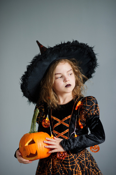 Halloween. Girl portray evil sorceress - Photo, Image