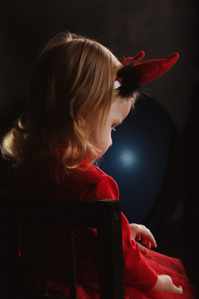 little devil on dark background - Fotografie, Obrázek