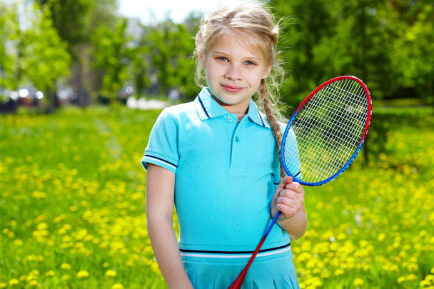 Girl with racquet - Фото, зображення