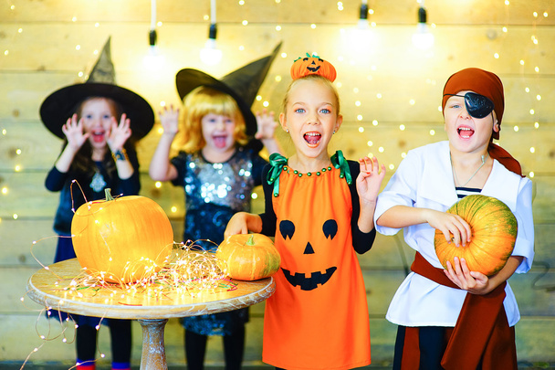 Happy group witch children during Halloween party - 写真・画像