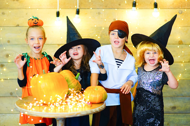 Happy group witch children during Halloween party - Foto, Imagen