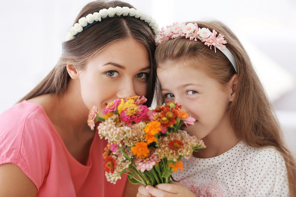 Greetings from daughter with flowers. Mothers day concept - Foto, imagen