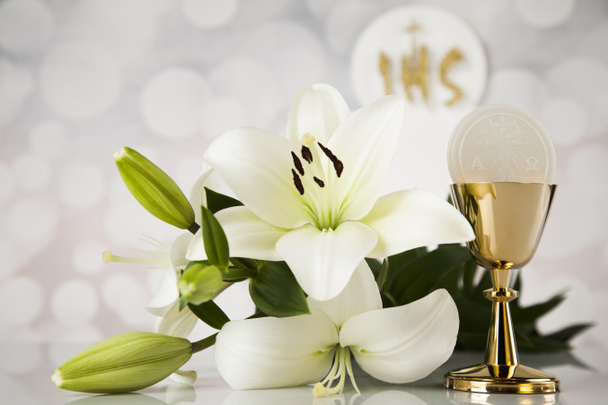 Holy communion and a golden chalice with flowers - Photo, Image