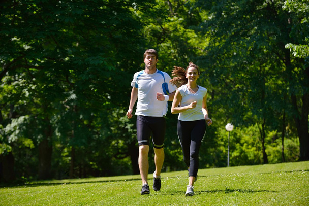 Young couple jogging - Foto, Imagen