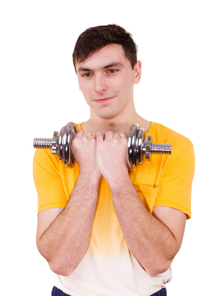 Man exercising with dumbbells lifting weights  - Photo, Image