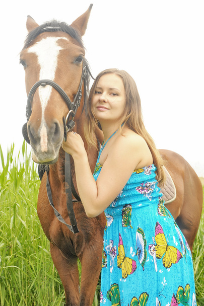 The girl with a horse - Foto, Imagen