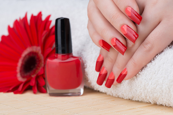 Feminine red and orange fingernails - Фото, зображення