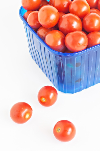 blue plastic box full of tomatoes isolated - Photo, Image