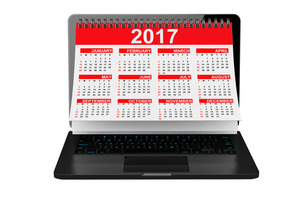 De kalender van 2017 jaar over Laptop scherm. 3D-rendering - Foto, afbeelding
