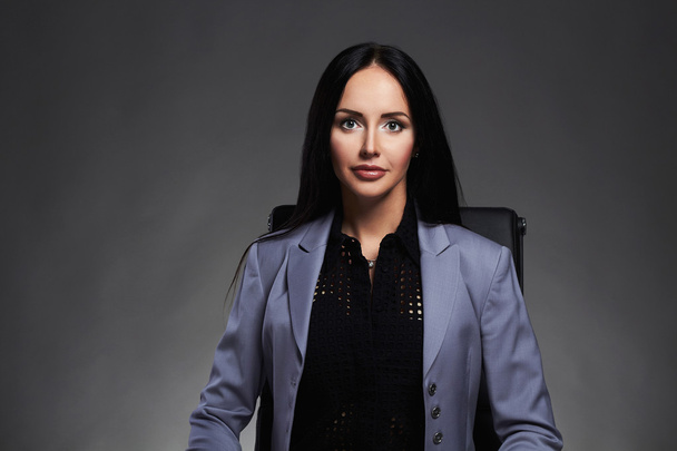business lady in suit. business lady,elegant beautiful business woman sitting on chair - Foto, imagen