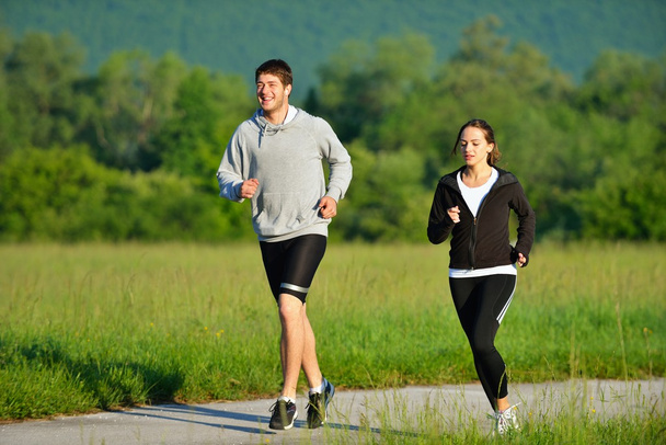 Young couple jogging - Foto, Bild