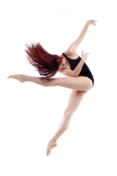 Beautiful ballet-dancer posing in studio - Photo, Image
