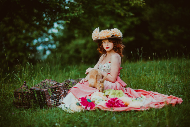 young woman with rabbit - Photo, image