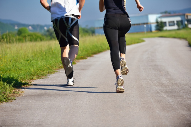 Young couple jogging - Fotoğraf, Görsel
