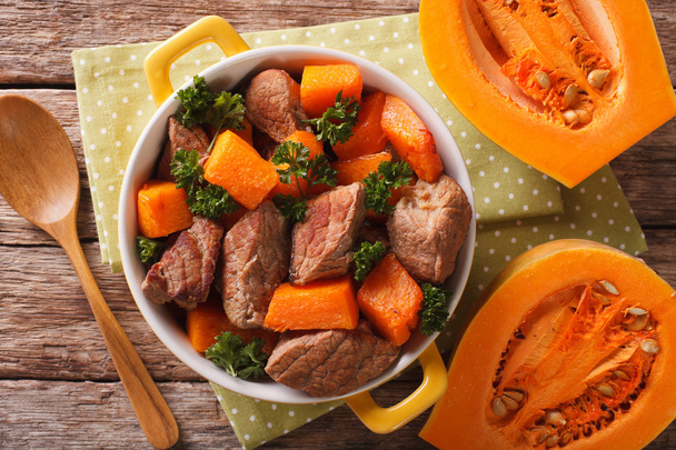 Healthy food: Beef stew with pumpkin and spices closeup. Horizon - Photo, Image