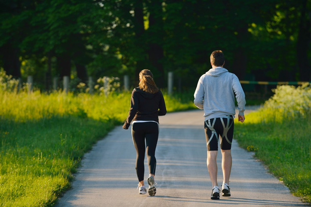 Young couple jogging - Φωτογραφία, εικόνα