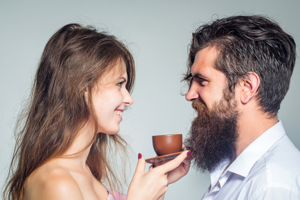 young couple with coffee cup - Фото, изображение